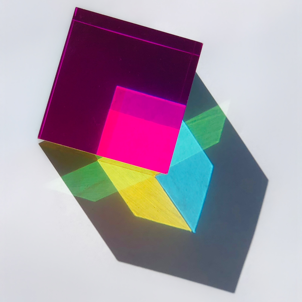 Colorful transparent sheets with a gradient effect on a white background