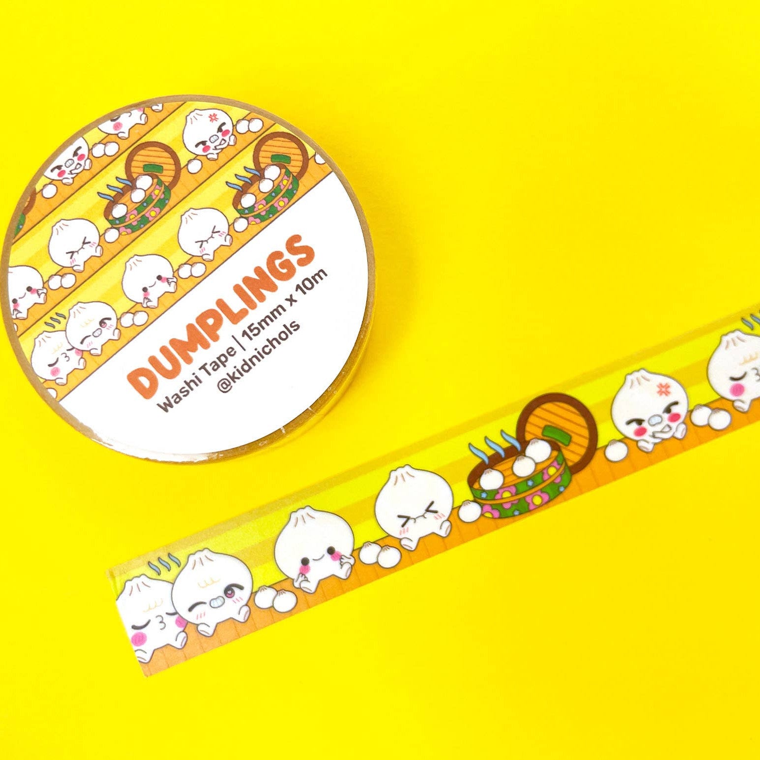 Washi tape with dumpling design on a yellow background