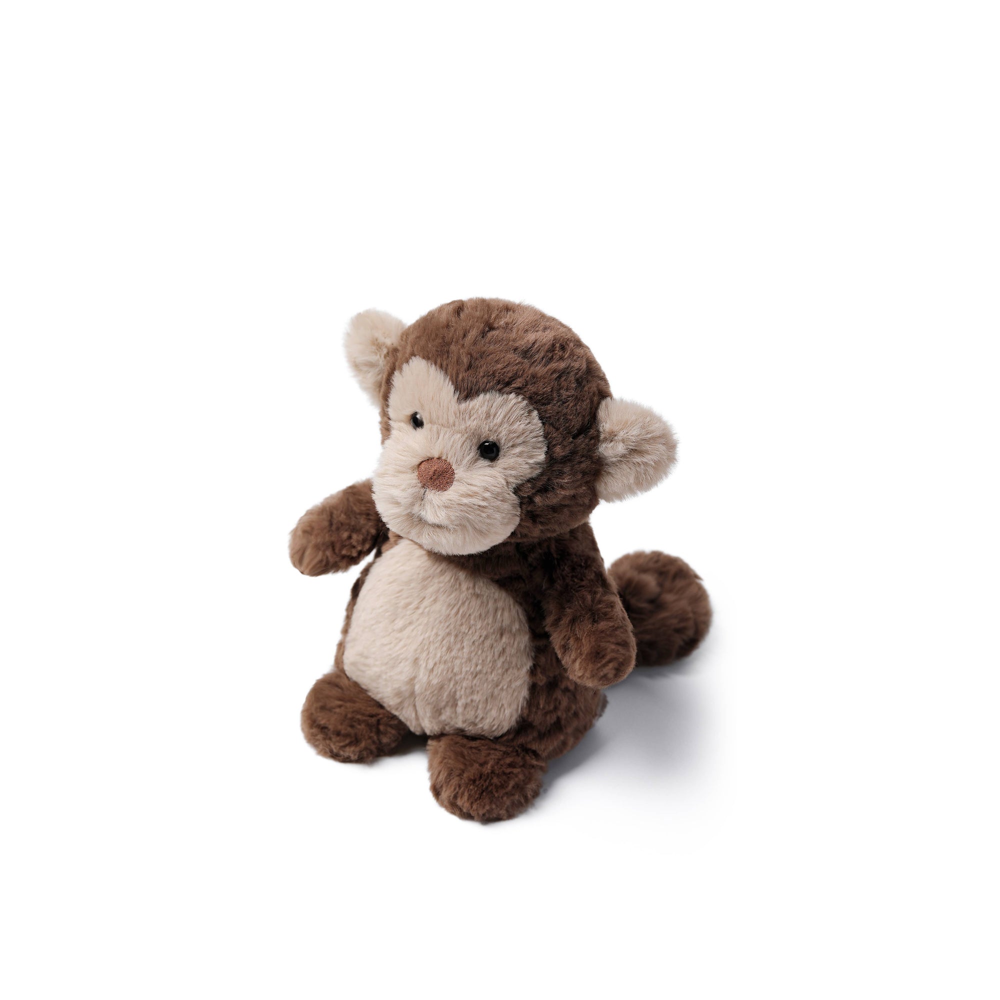 A plush stuffed monkey toy in shades of brown and cream, sitting against a plain white background.