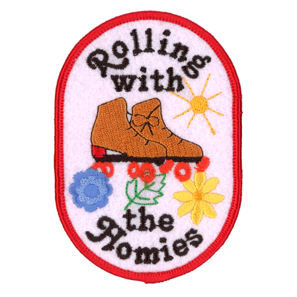 Patch with roller skates and flowers and text 'Rolling with the Homies' on a white background