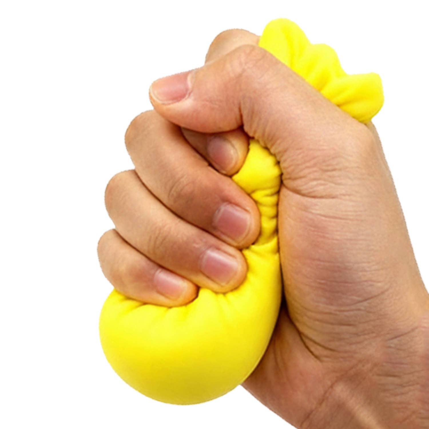 Hand squeezing a yellow stress ball against a white background