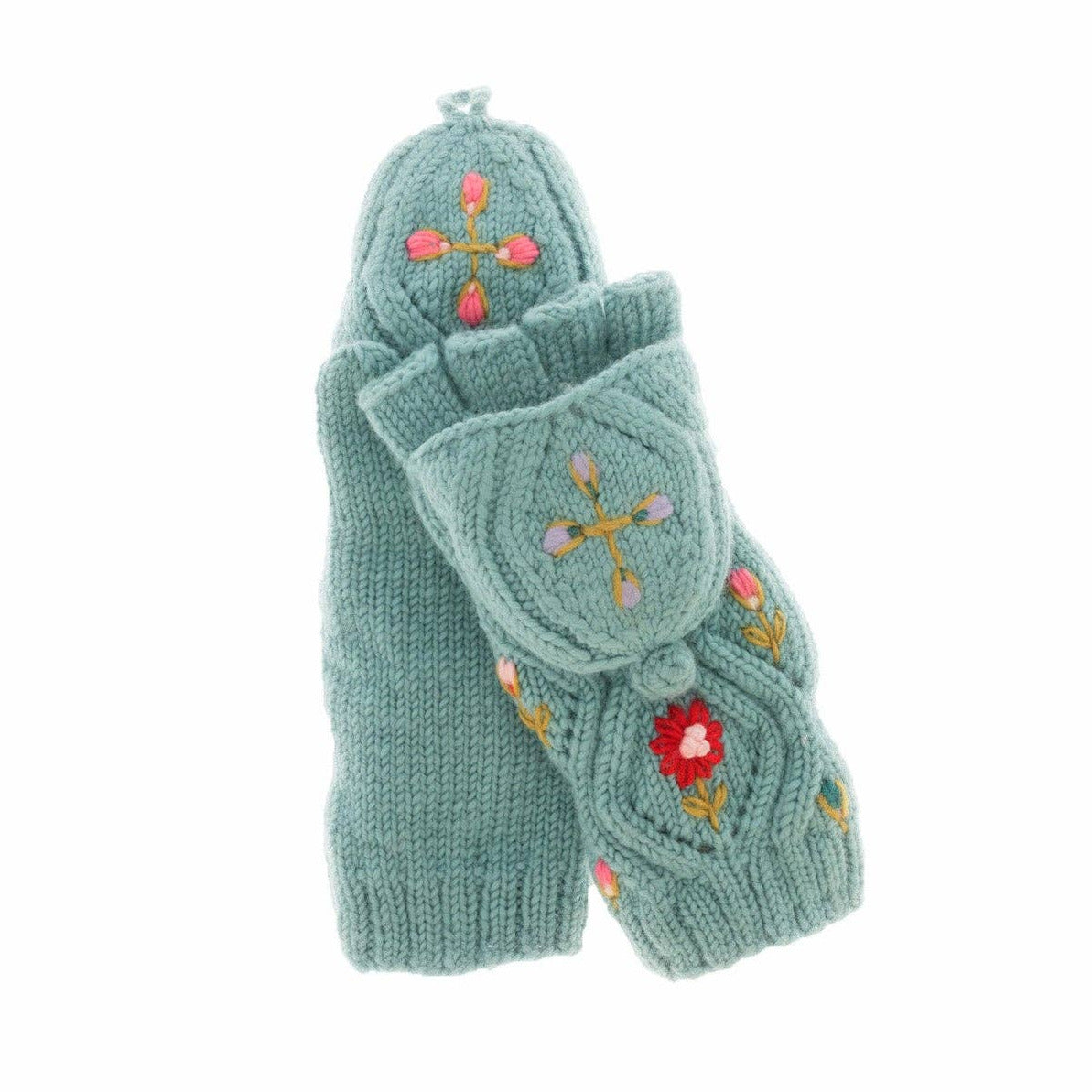 A pair of knitted winter mittens in a dusty sage green color, decorated with colorful floral and cross motifs in red, pink, yellow, and orange, shown on a plain white background.