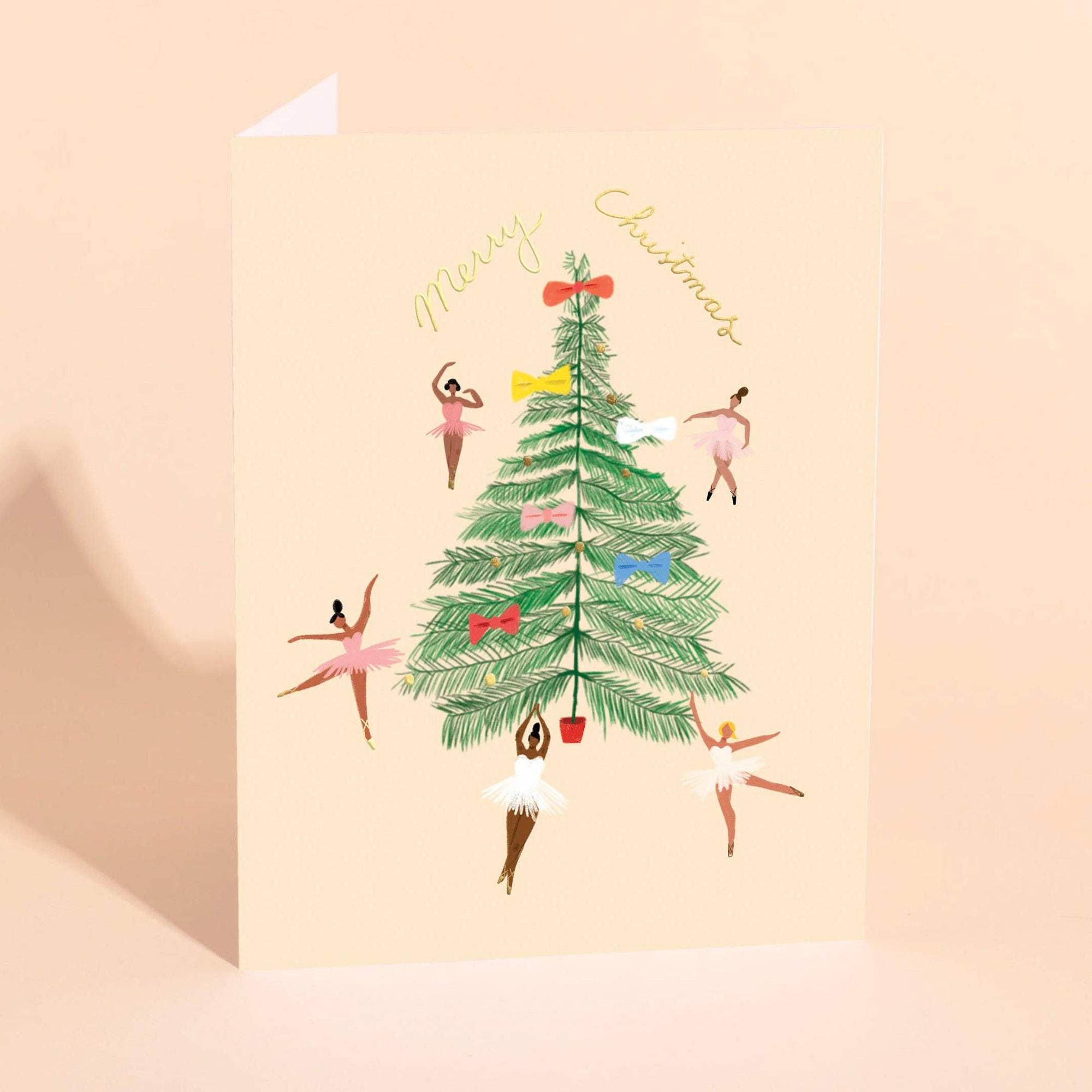 Greeting card with a Christmas tree and ballerina design on a beige background