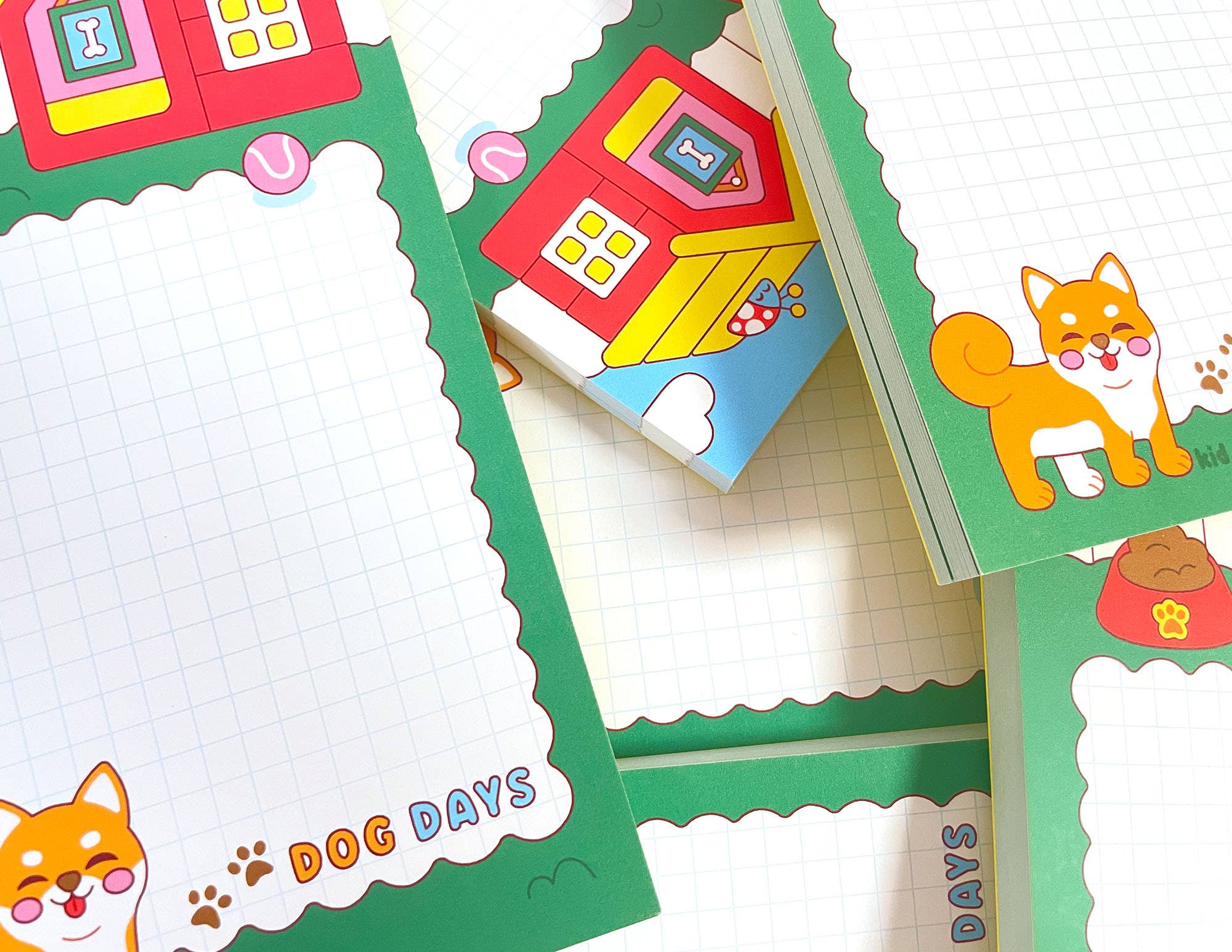 Colorful stationery items with cartoon dog designs on a white background