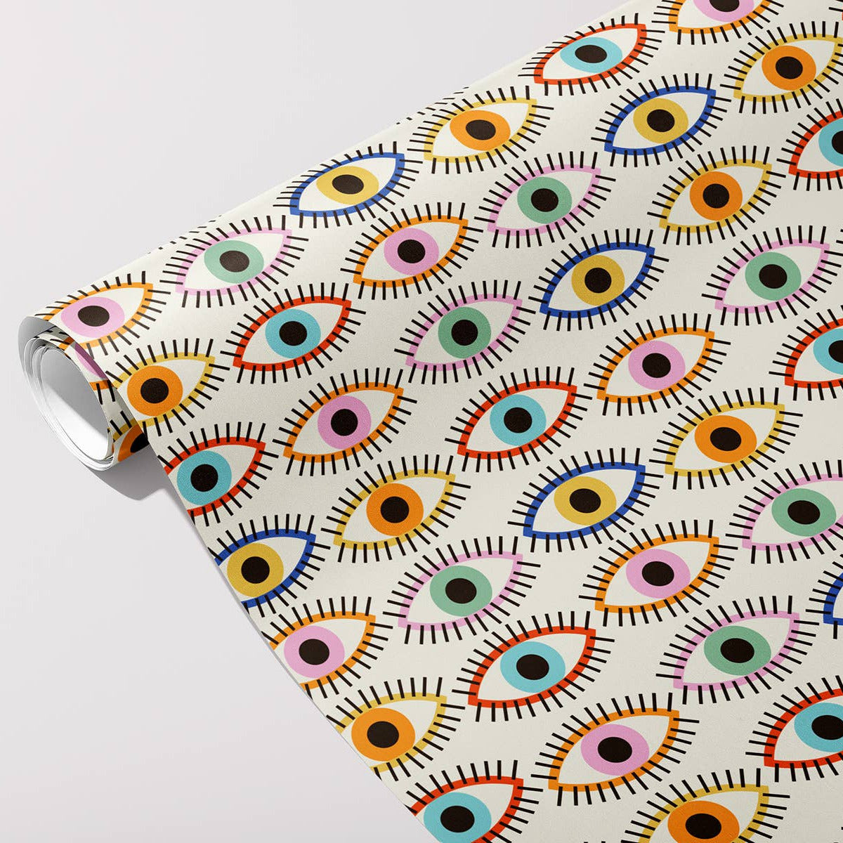 Colorful eye patterned fabric on a white background