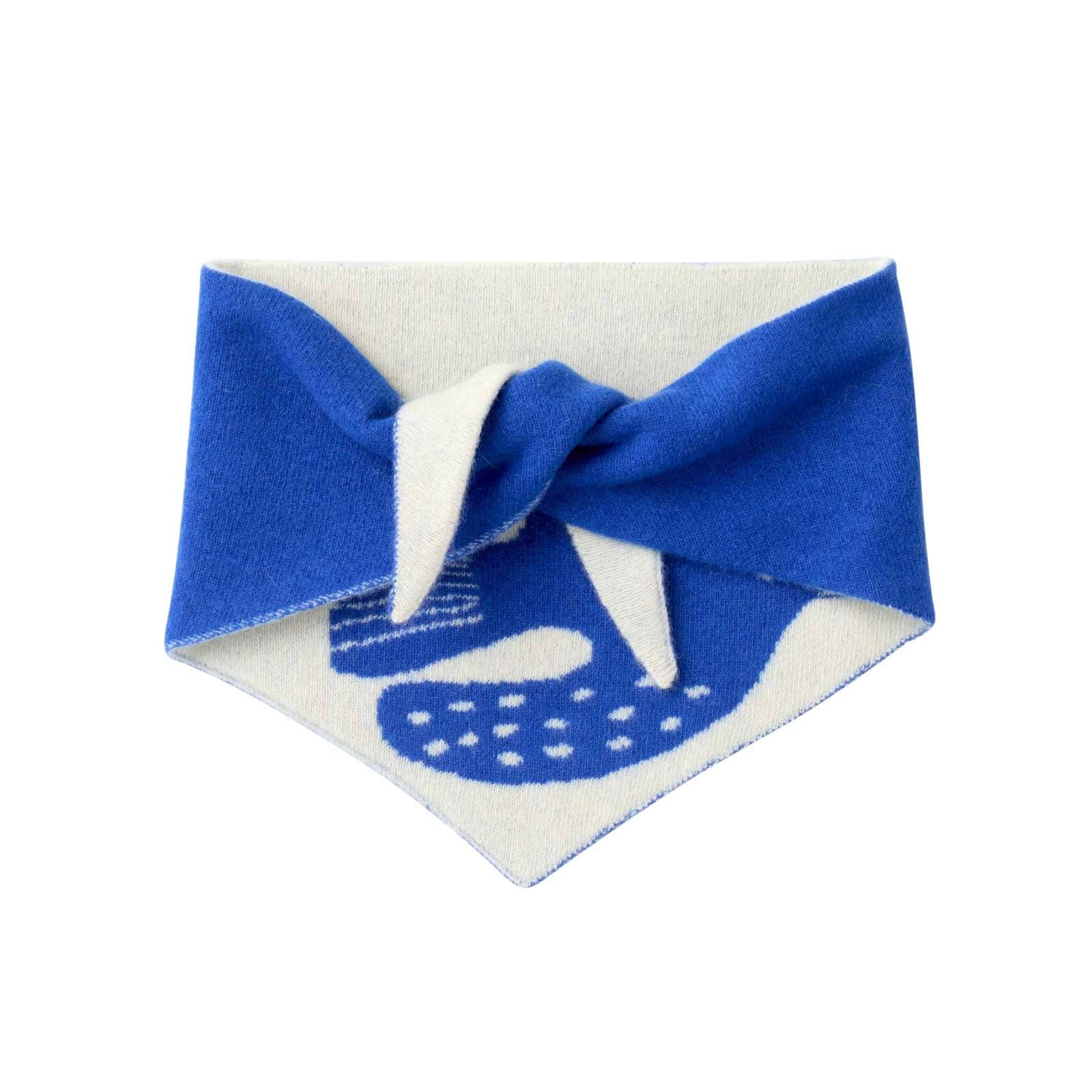 Blue and white patterned fabric with a knot on a white background