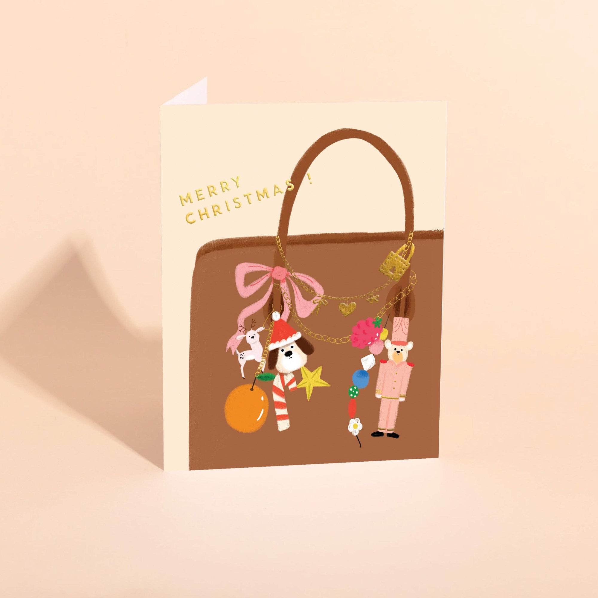 Illustrated Christmas gift bag with cartoon characters on a beige background