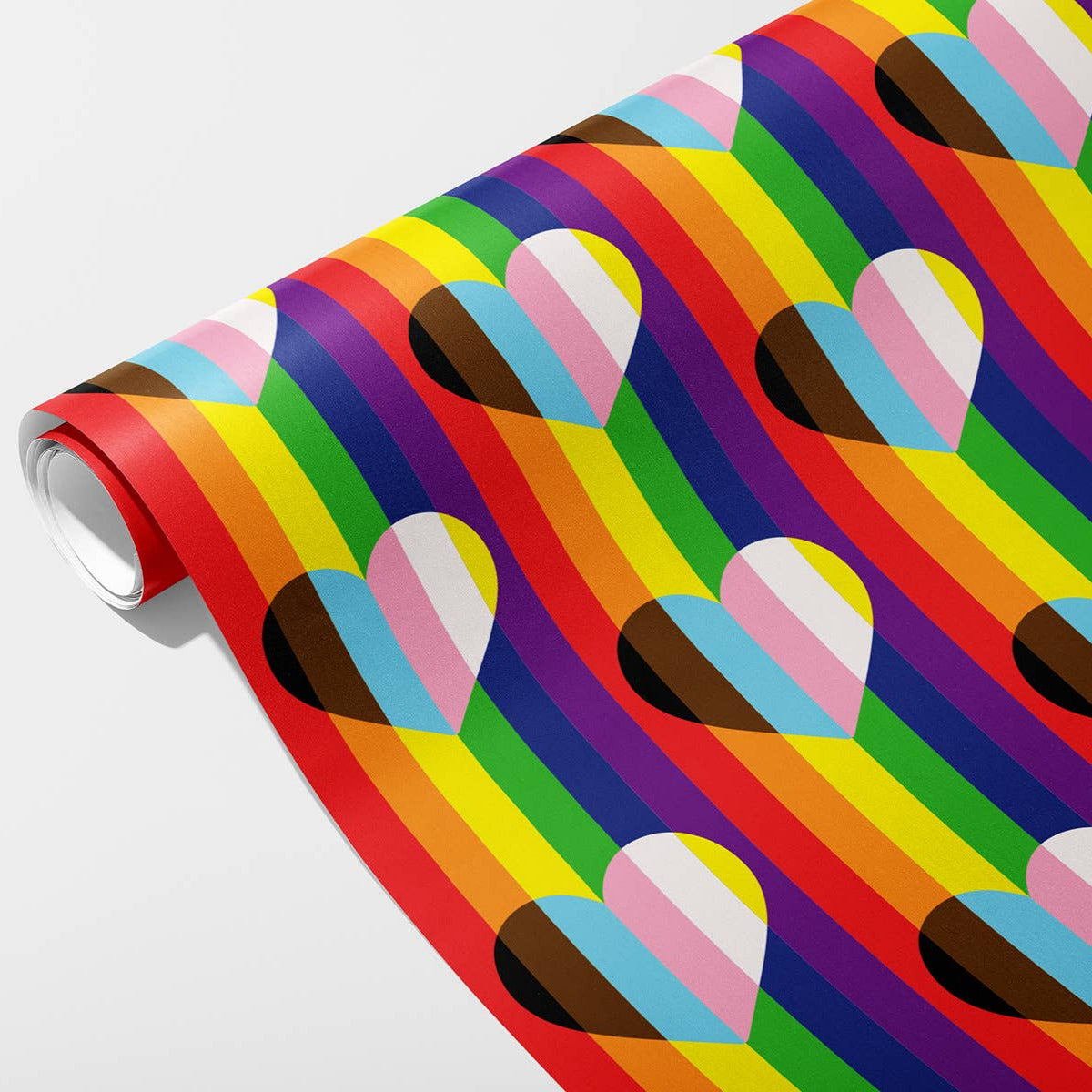 Roll of paper with colorful heart pattern on a rainbow background