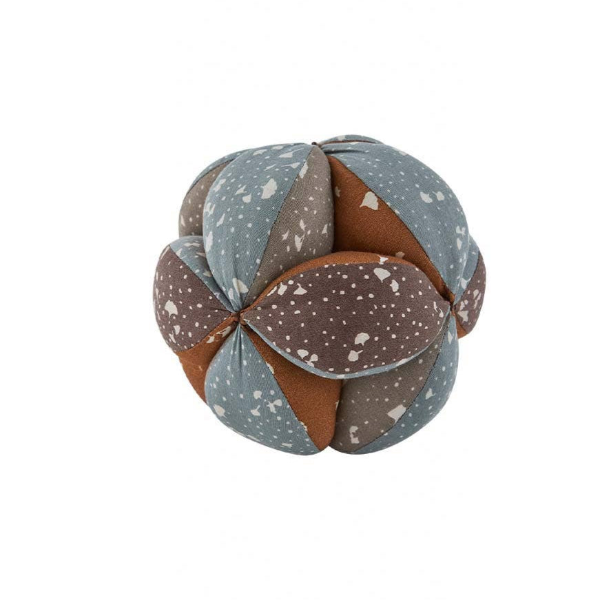 Textured ball-shaped object with a pattern on a white background