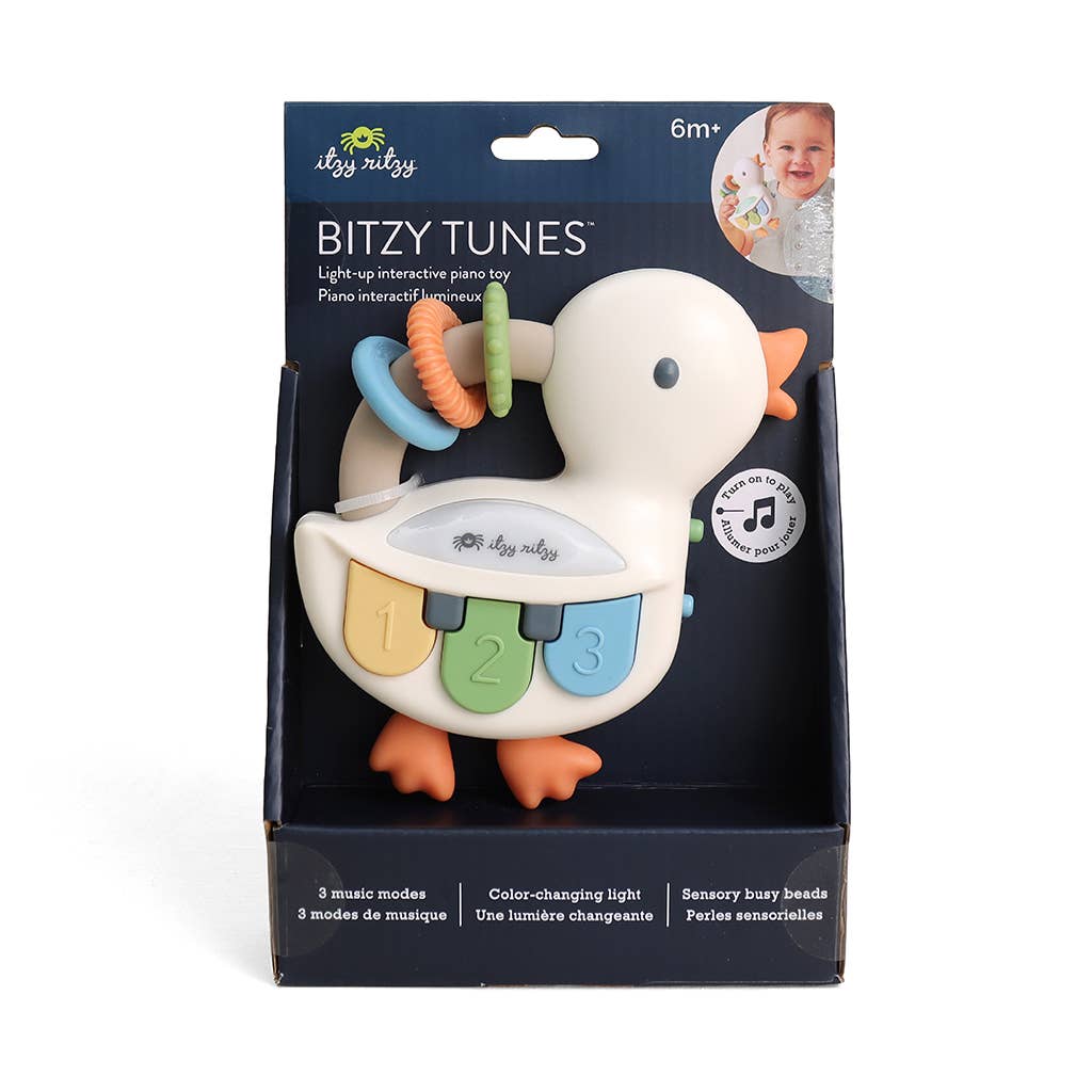 Bitzy Tunes toy packaging with a duck design on a white background
