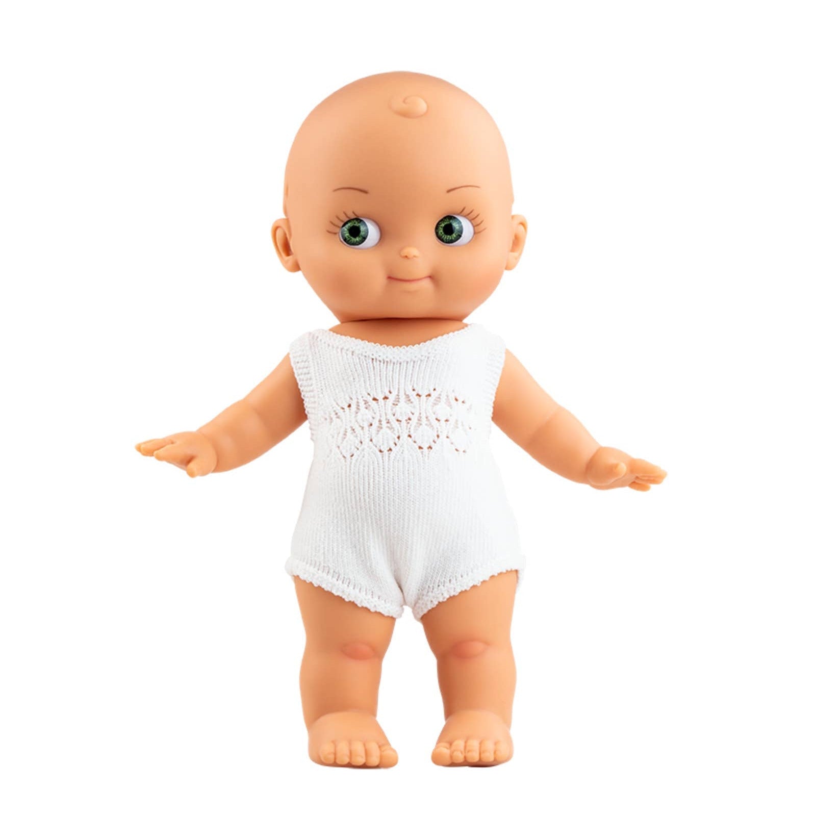 Baby doll wearing a white outfit on a white background
