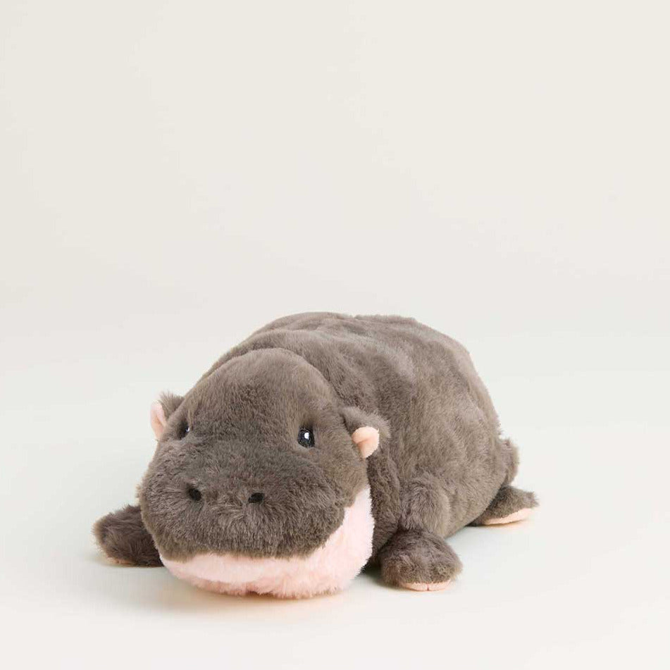 Plush toy hippo on a white background