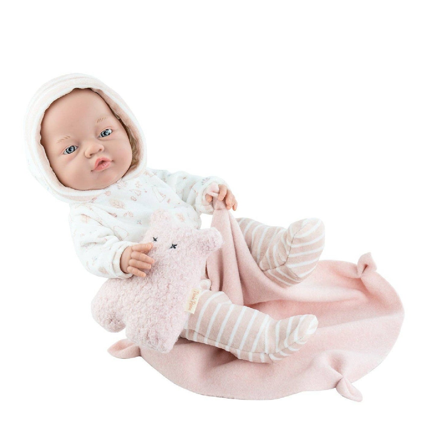 Baby doll in a white outfit with a pink blanket and toy on a white background