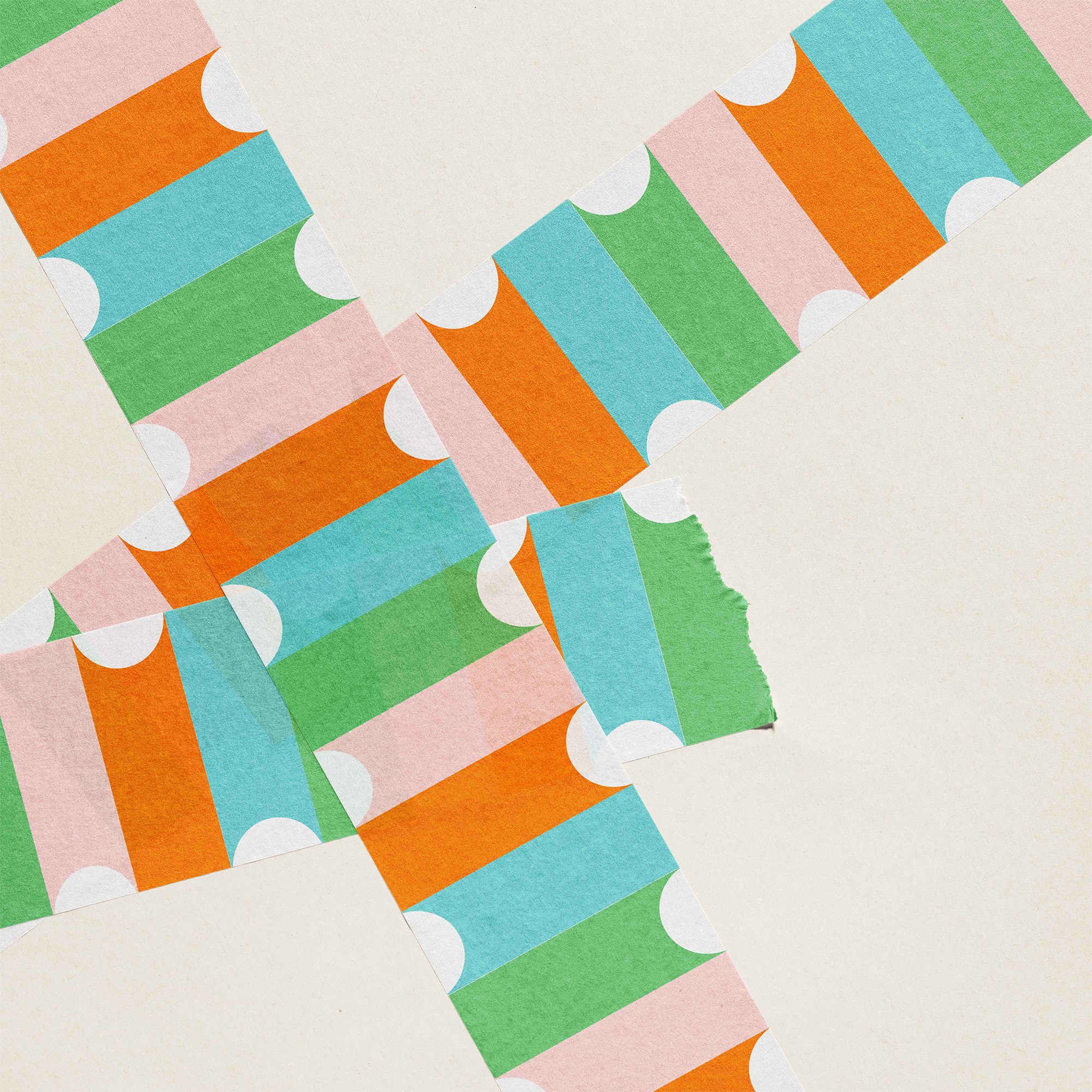 Colorful patterned paper sheets on a beige background