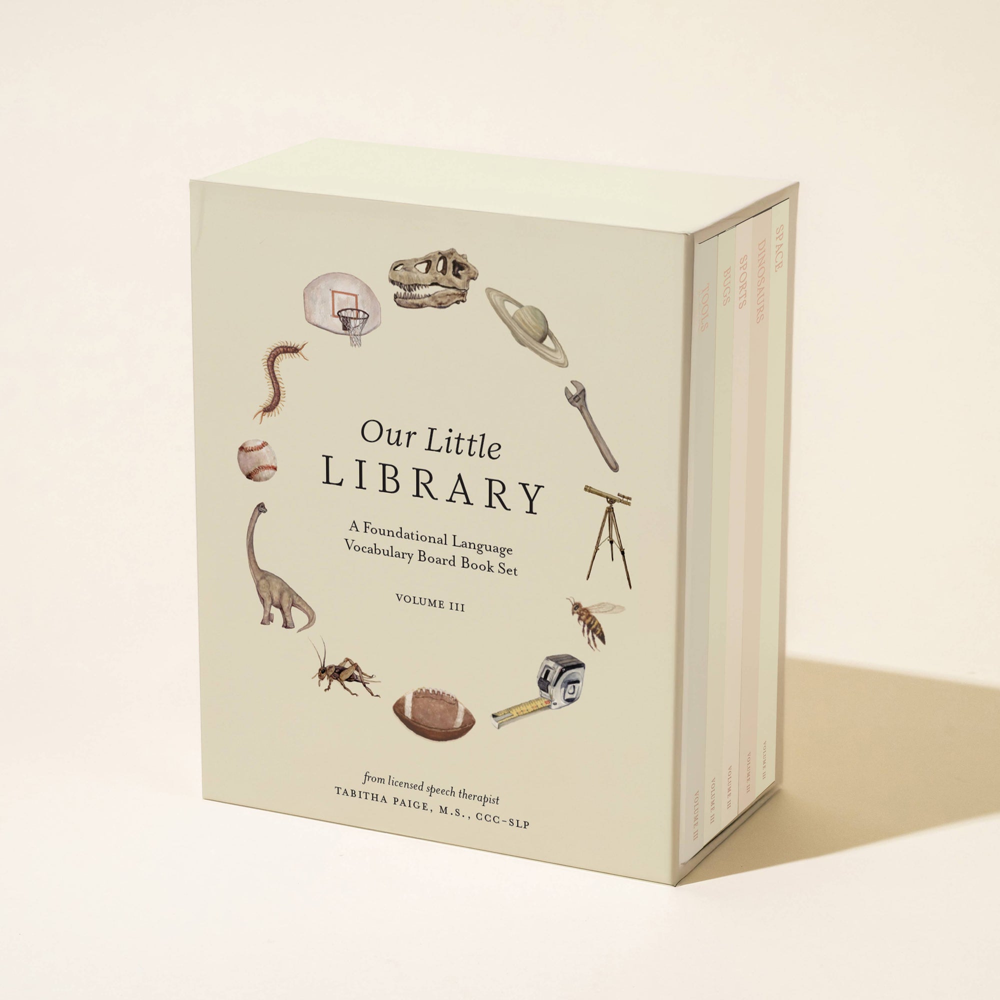 Book titled 'Our Little Library' with illustrations on a beige background