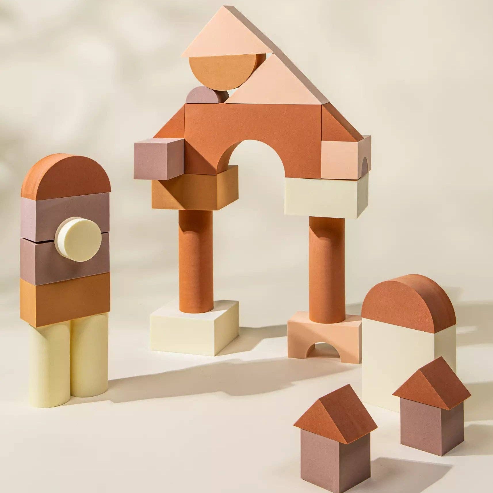 Colorful geometric building blocks on a neutral background