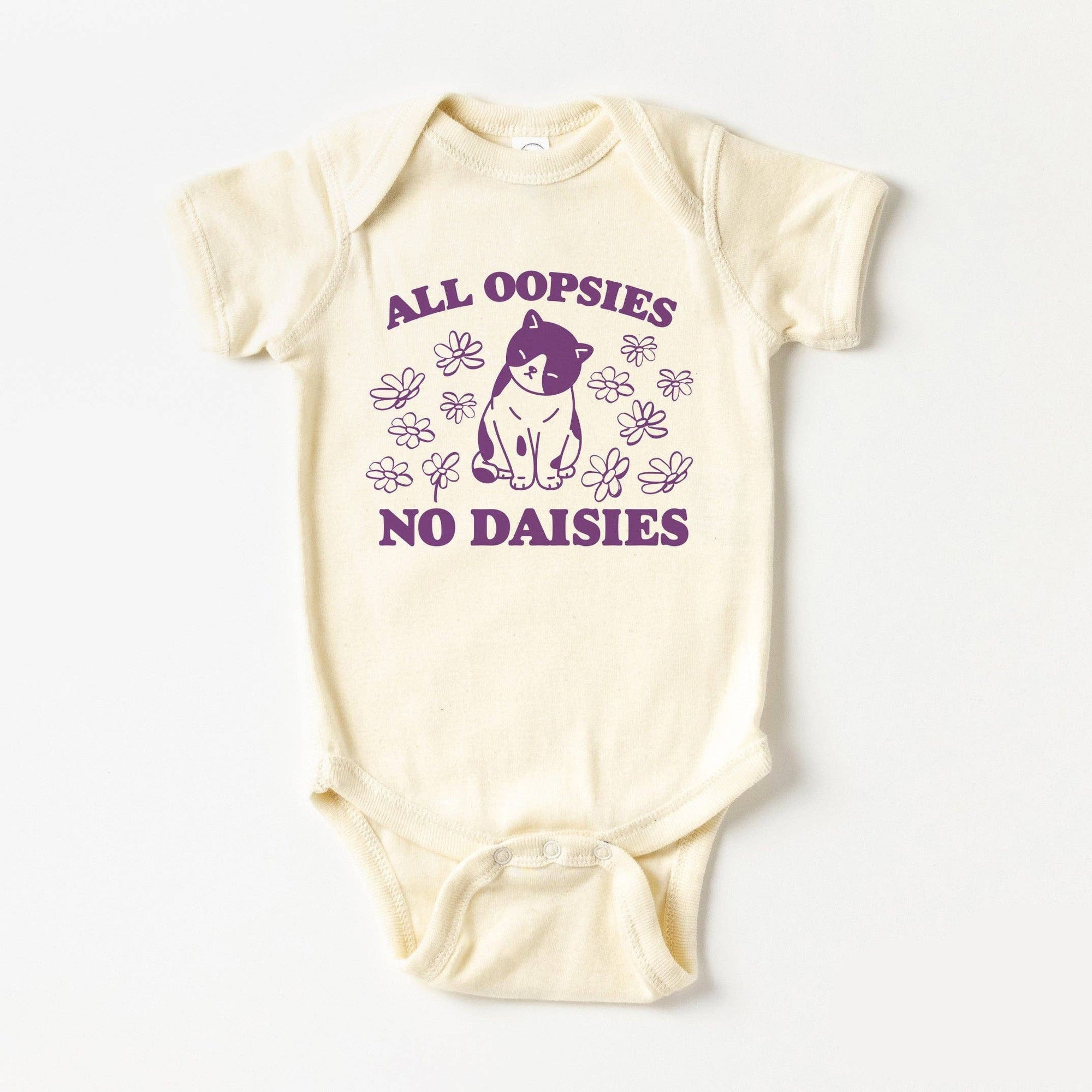 Baby onesie with text and graphic design on a white background