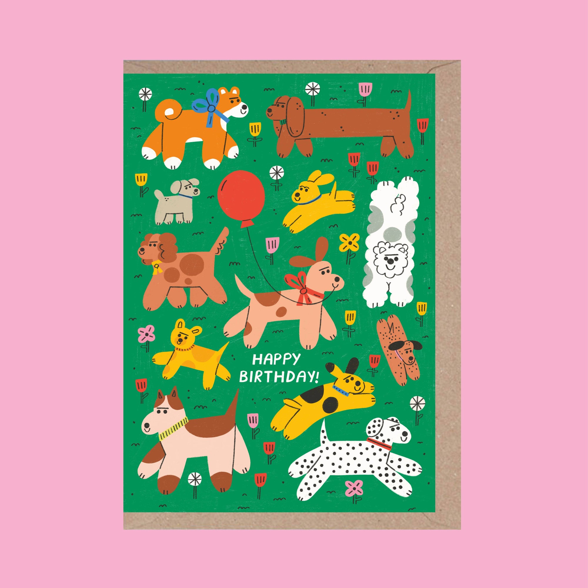 Illustrated birthday card with dogs on a green background