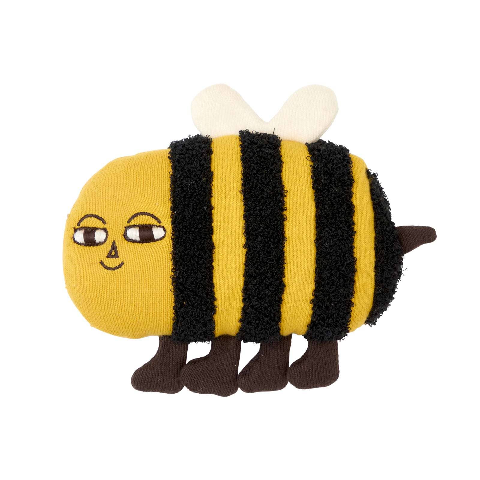 Toy bee with a smiling face on a white background