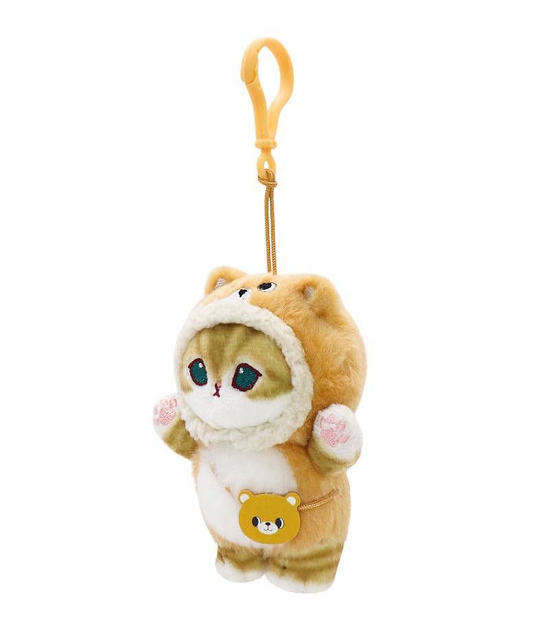Plush keychain of a cat in a cat coat with a gold clip on a white background