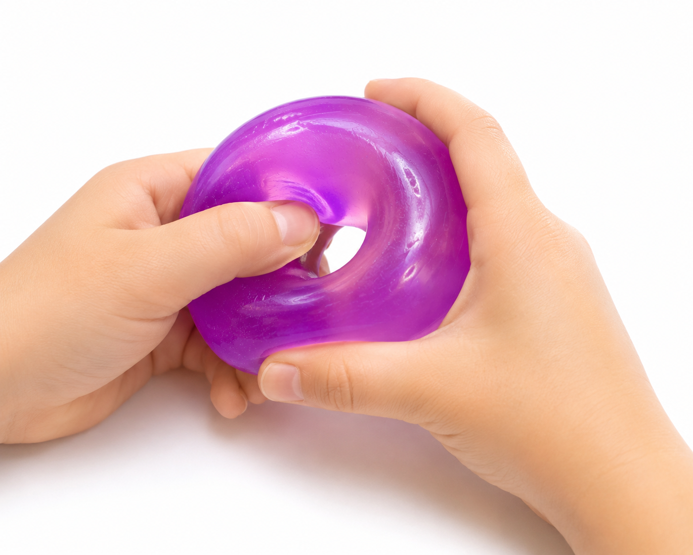 Purple stress ball being held by two hands on a white background