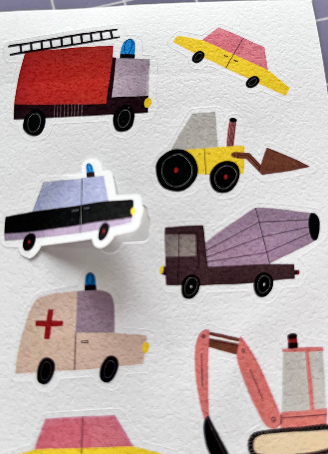 Set of colorful toy vehicle illustrations on a white background