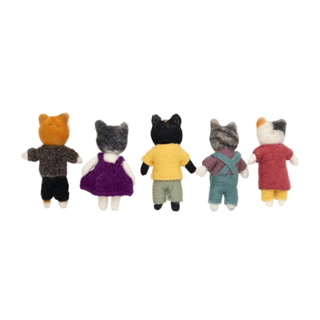 Five small stuffed animal figures of cats in various outfits on a white background