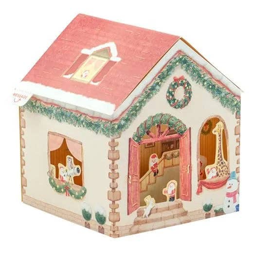 Decorative house-shaped box with Christmas-themed illustrations on a white background