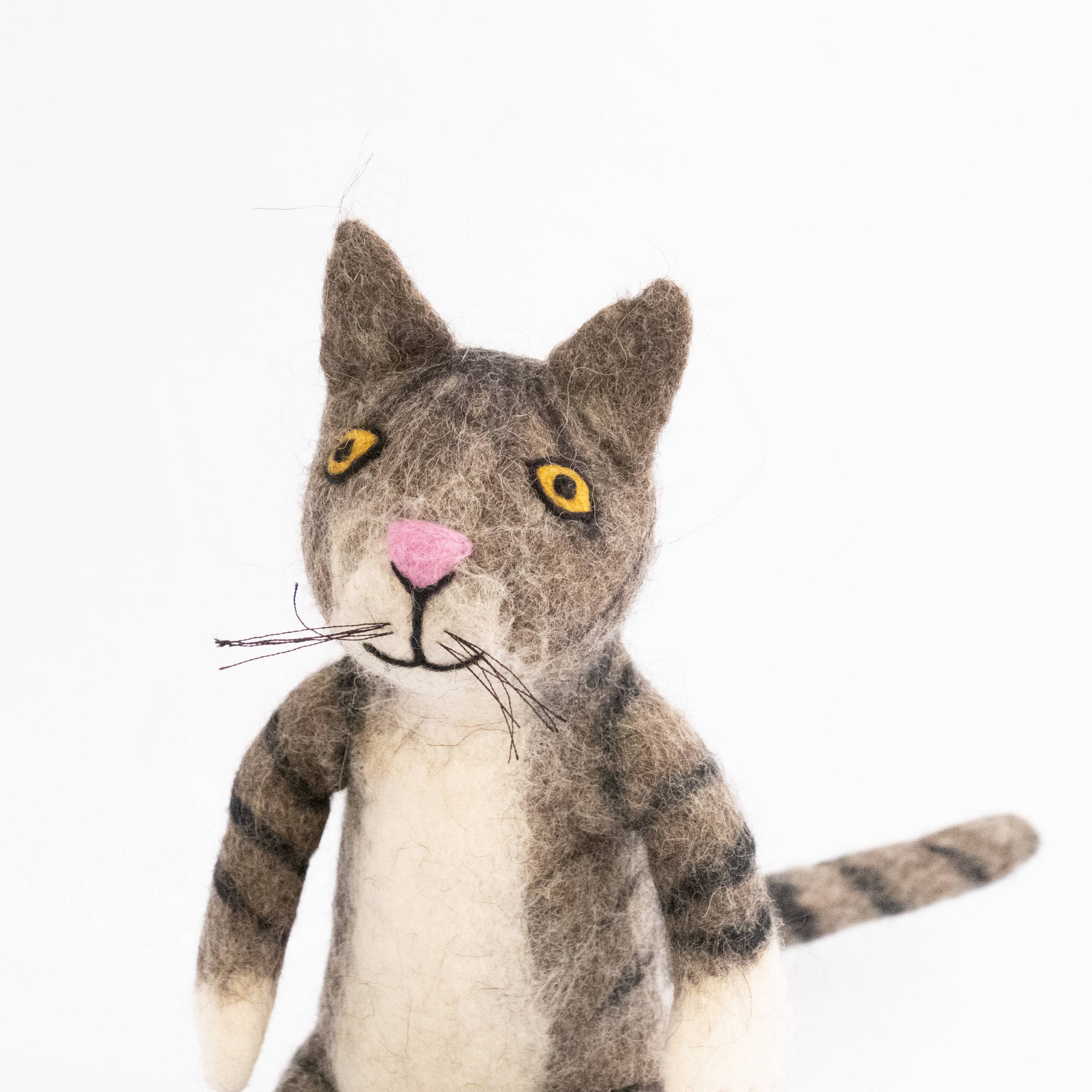 Stuffed cat toy with a white background