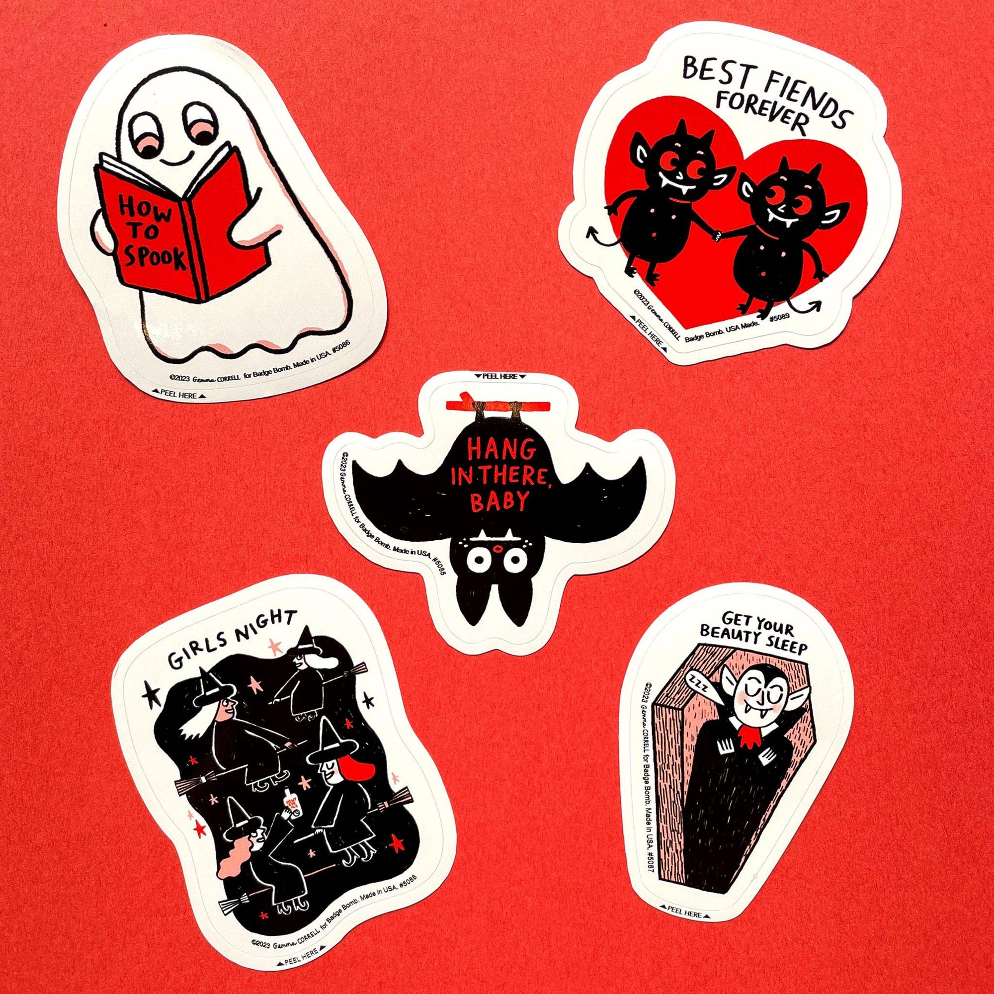 Set of Halloween-themed stickers on a red background