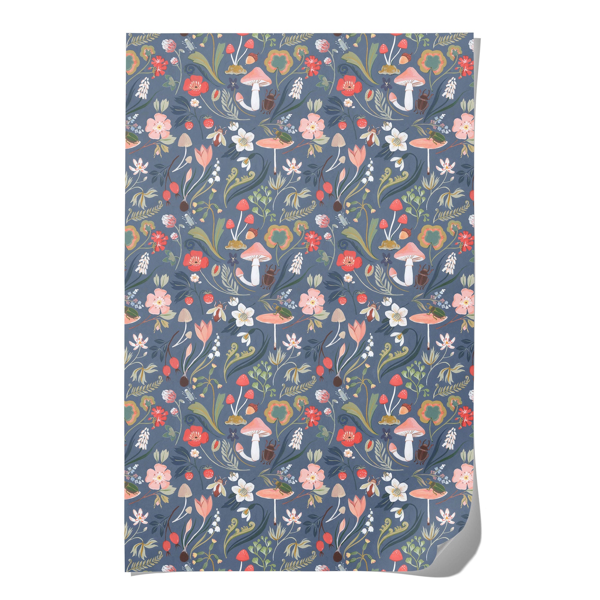 Notebook with floral and mushroom pattern on a blue background