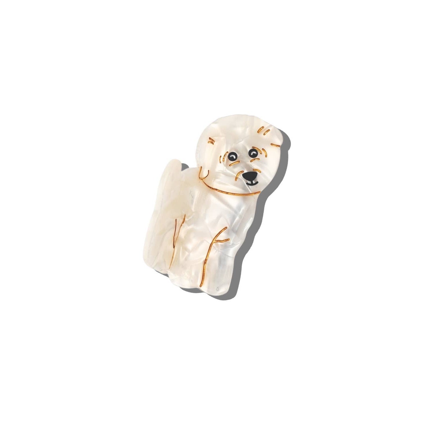 Small acrylic dog figurine on a white background