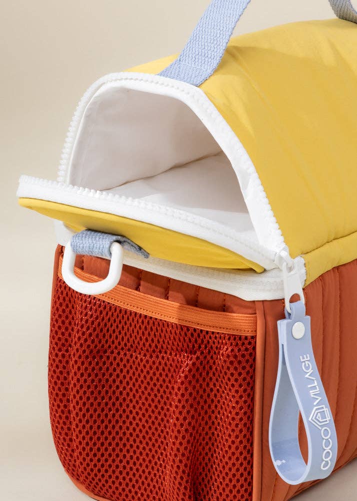 Multicolored bag with a visible brand logo on a beige background