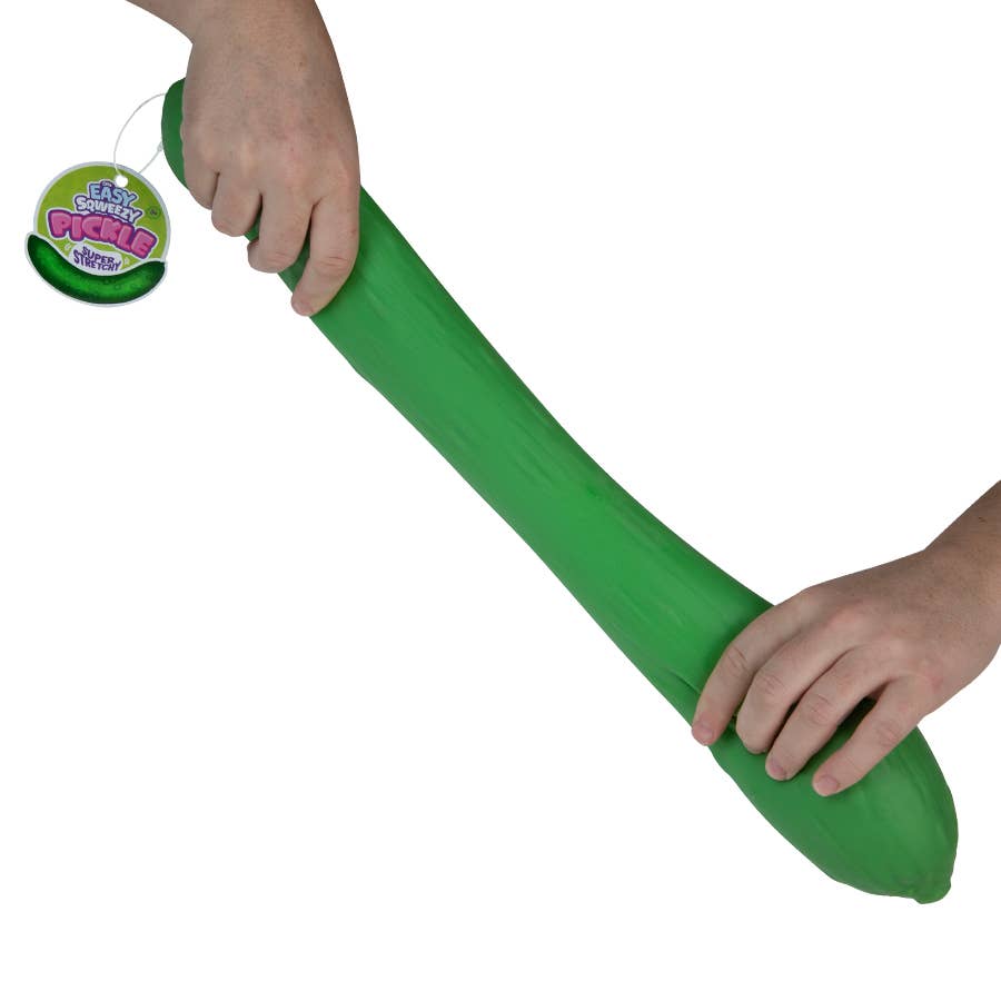 Green rubber toy with a hand holding it on a white background