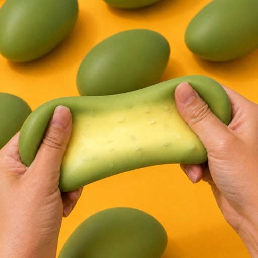 A pair of hands stretching a green squishy toy with a pale yellow center, set against a bright yellow background with other green squishies.