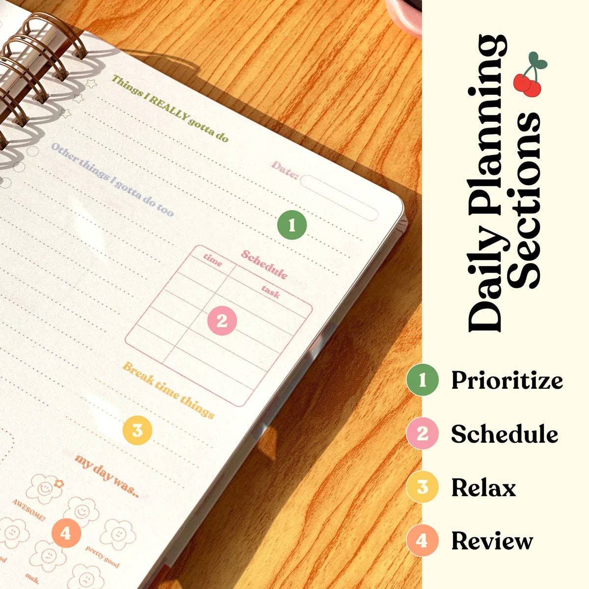 Daily planner with daily planning sections on a wooden surface