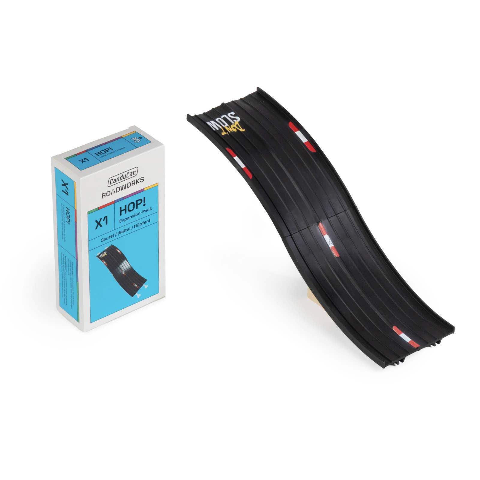Model car track and packaging on a white background