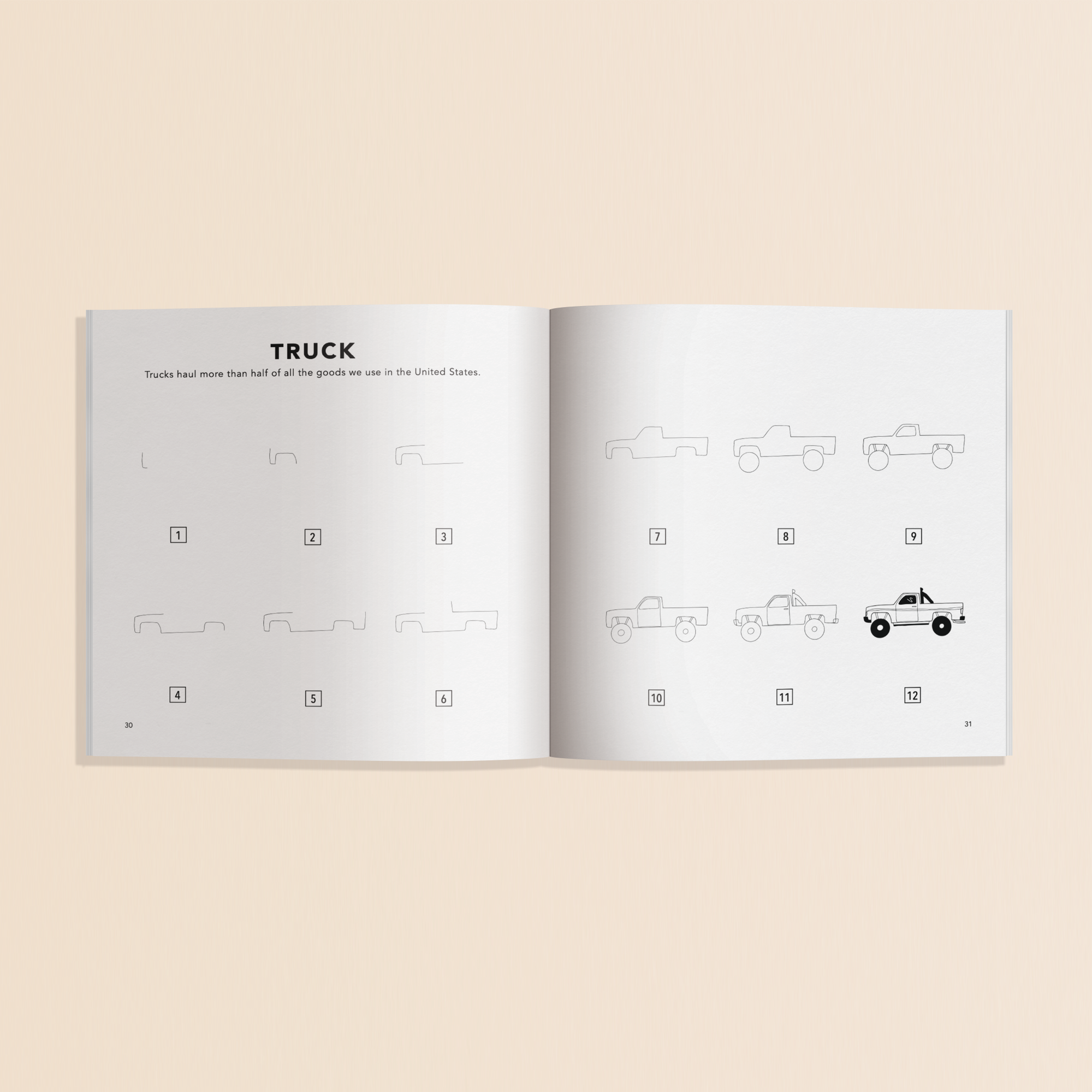 Open book showing illustrations of trucks on a beige background