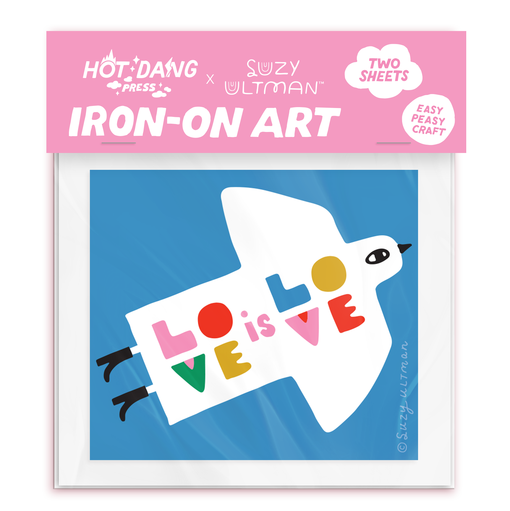 Iron-on art package with a dove holding a 'LOVE IS LOVE' sign on a blue background, featuring Hot Dang Press and Suzy Ultman branding.