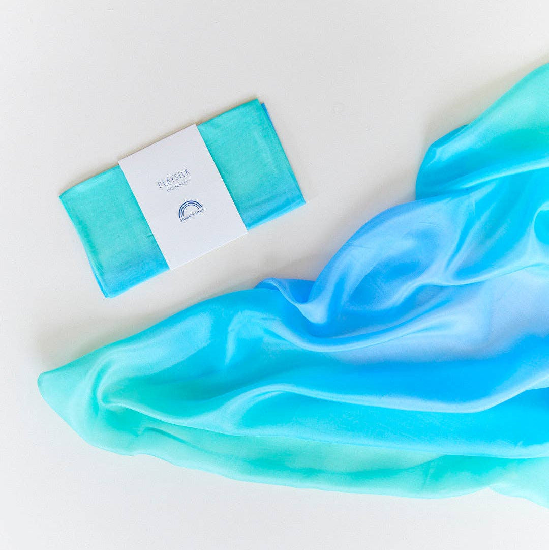 Turquoise silk on a white background