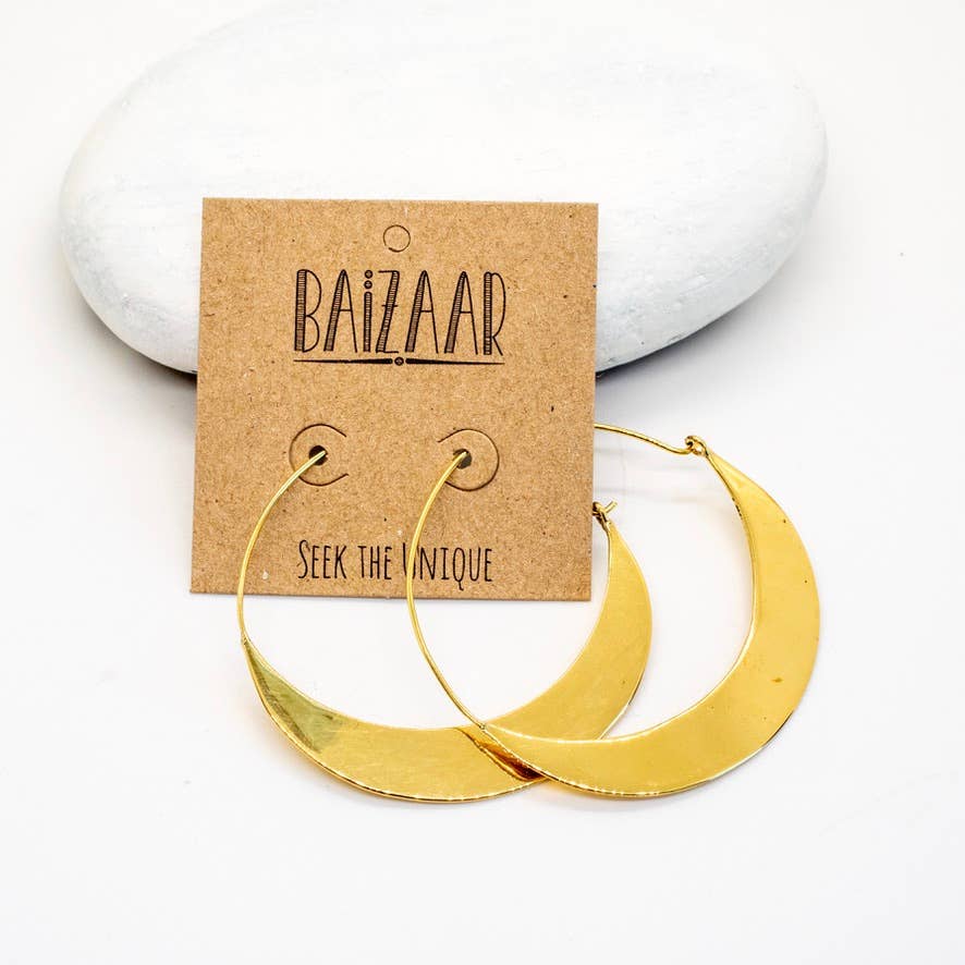 Gold hoop earrings on a BAIZZAAR branded card with a white background