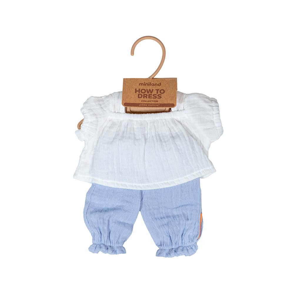 Doll'sWhite blouse with ruffled sleeves and light blue bloomers on a hanger with 'miniland' packaging.