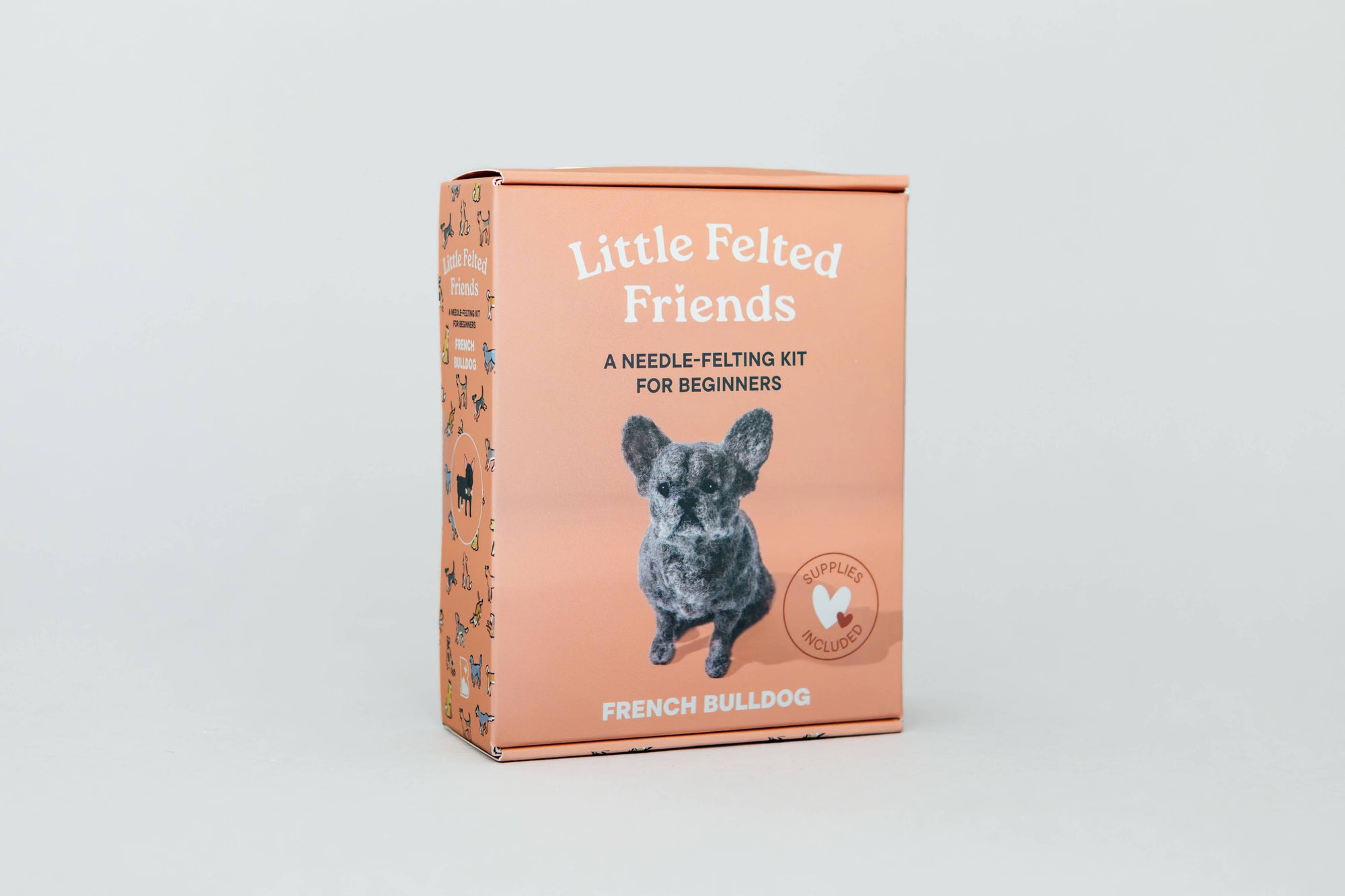 Box for a needle-felting kit for beginners featuring a French Bulldog on a light gray background