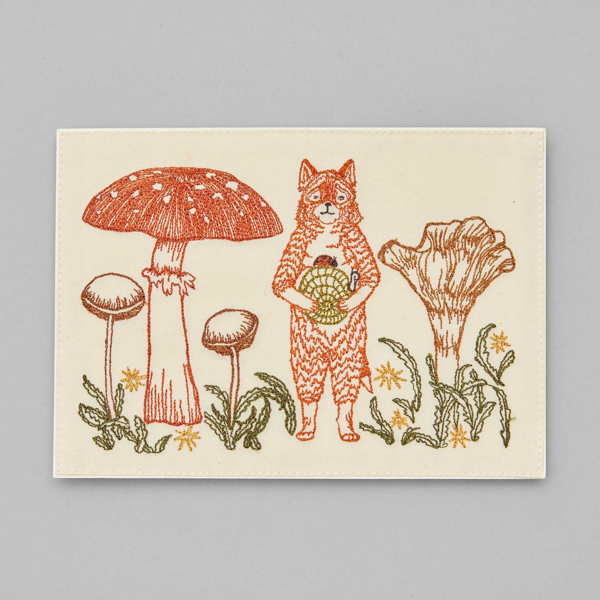 Illustration of a fox holding a snail with mushrooms and plants on a beige background