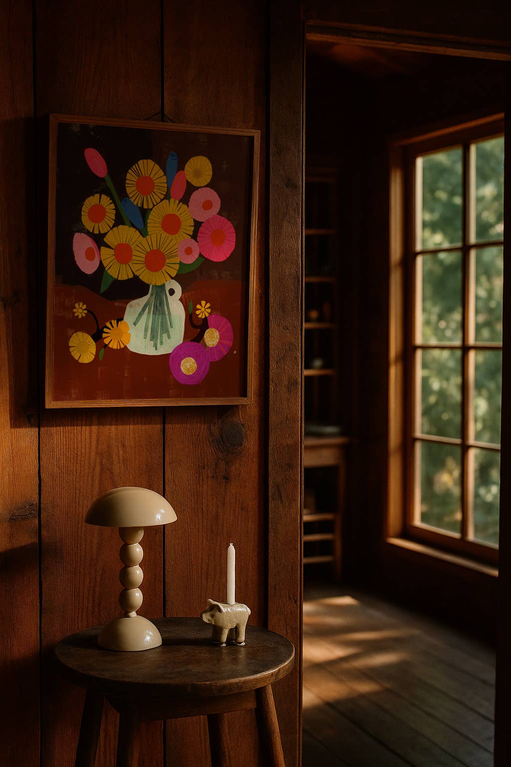 Decorative floral painting on a wooden wall with a small table and lamp in the foreground.