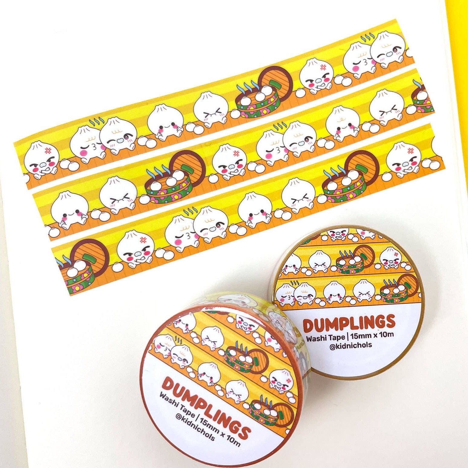 Decorative tape with cartoon dumpling design on a yellow background