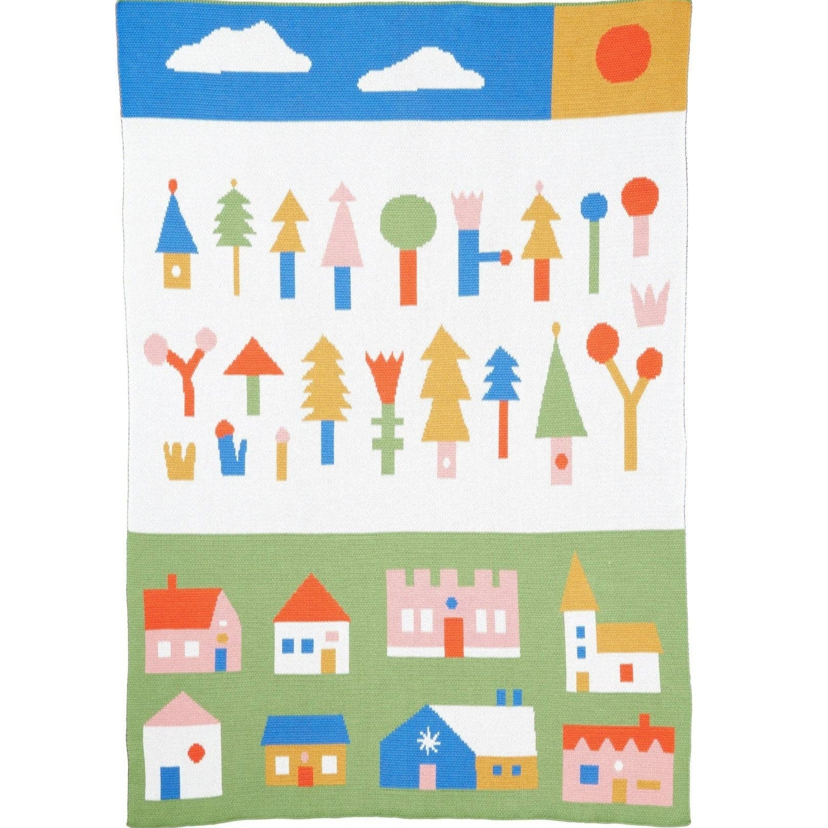 Children's blanket with colorful illustrations of houses, trees, and a sun on a white background