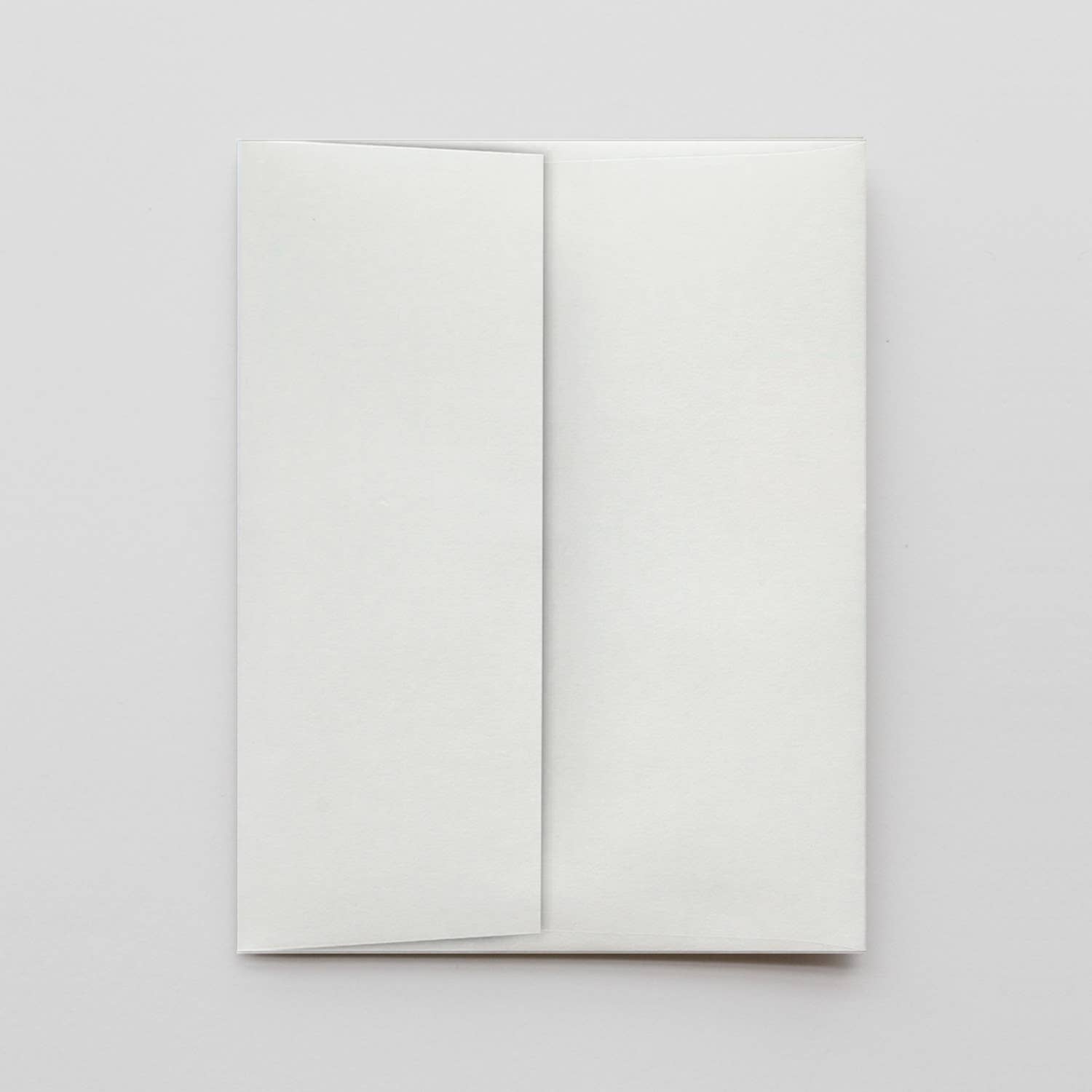 White notebook on a light gray background