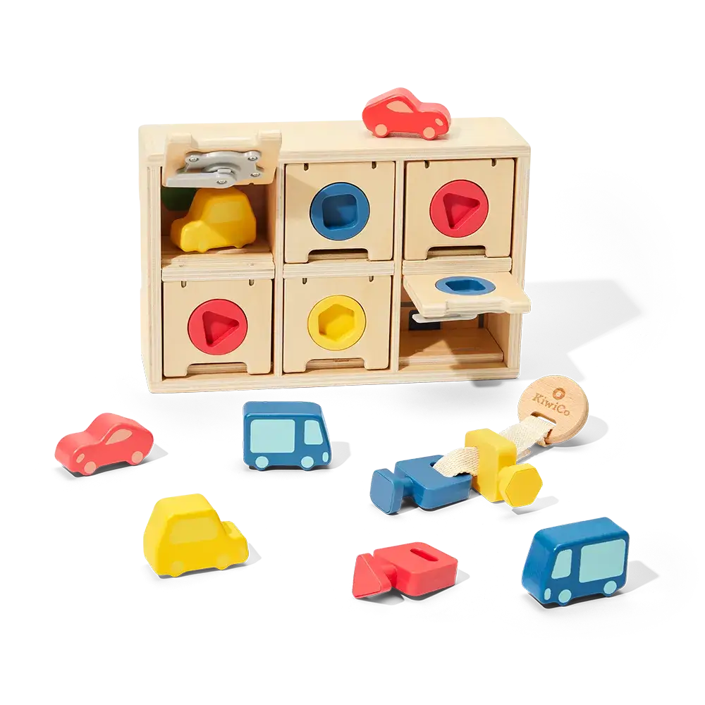 Wooden toy set with colorful shapes and vehicles on a white background