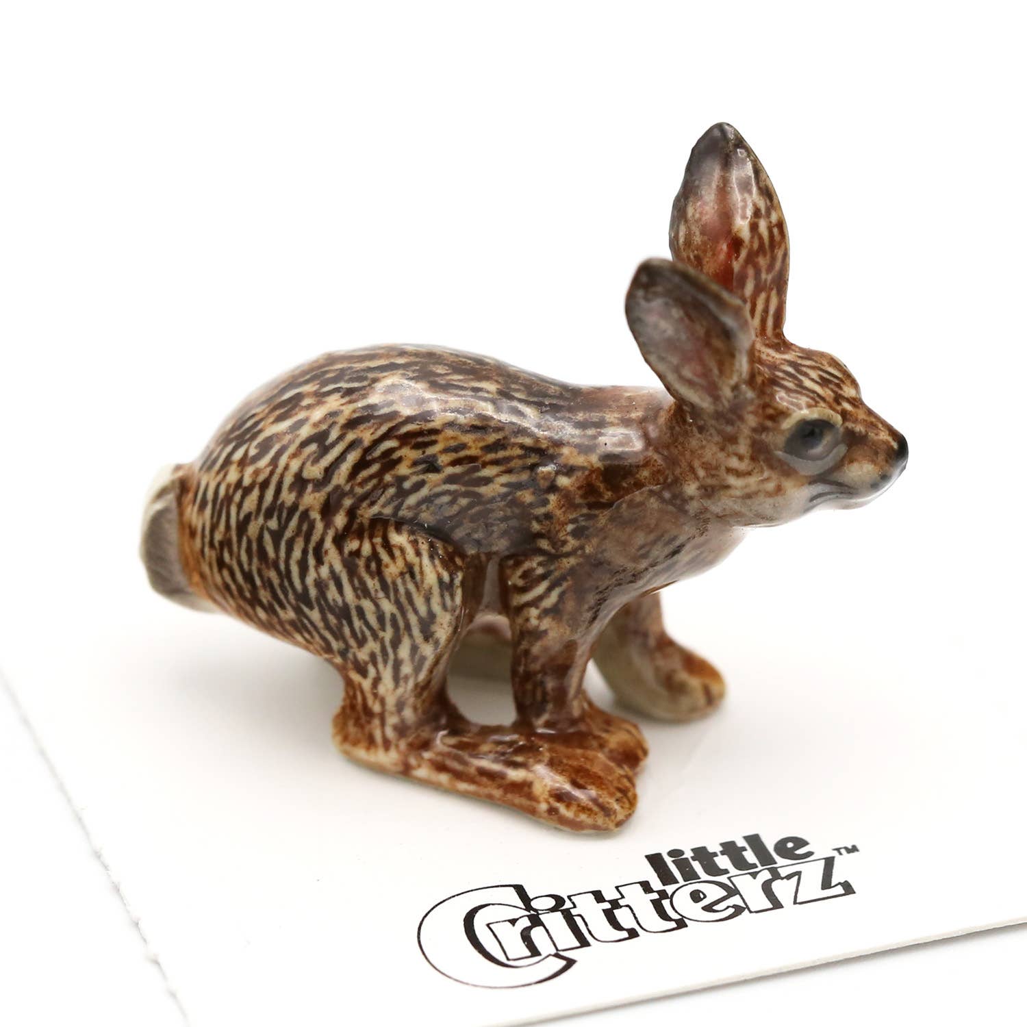 Small rabbit figurine with 'little Critterz' branding on a white background